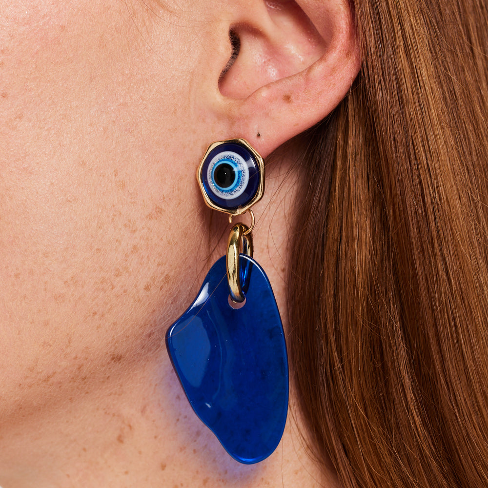 
                  
                    Liquorish Evil Eye Drop Style Earring With Abstract Shape Detail
                  
                