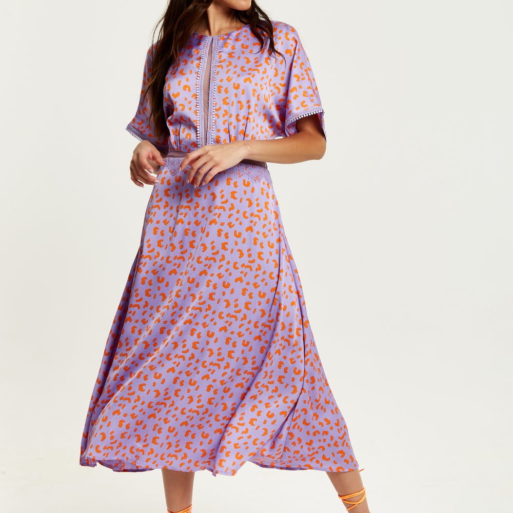 
                  
                    Liquorish Cheetah Print Midi Dress With Mesh Detailing In Lilac And Orange
                  
                