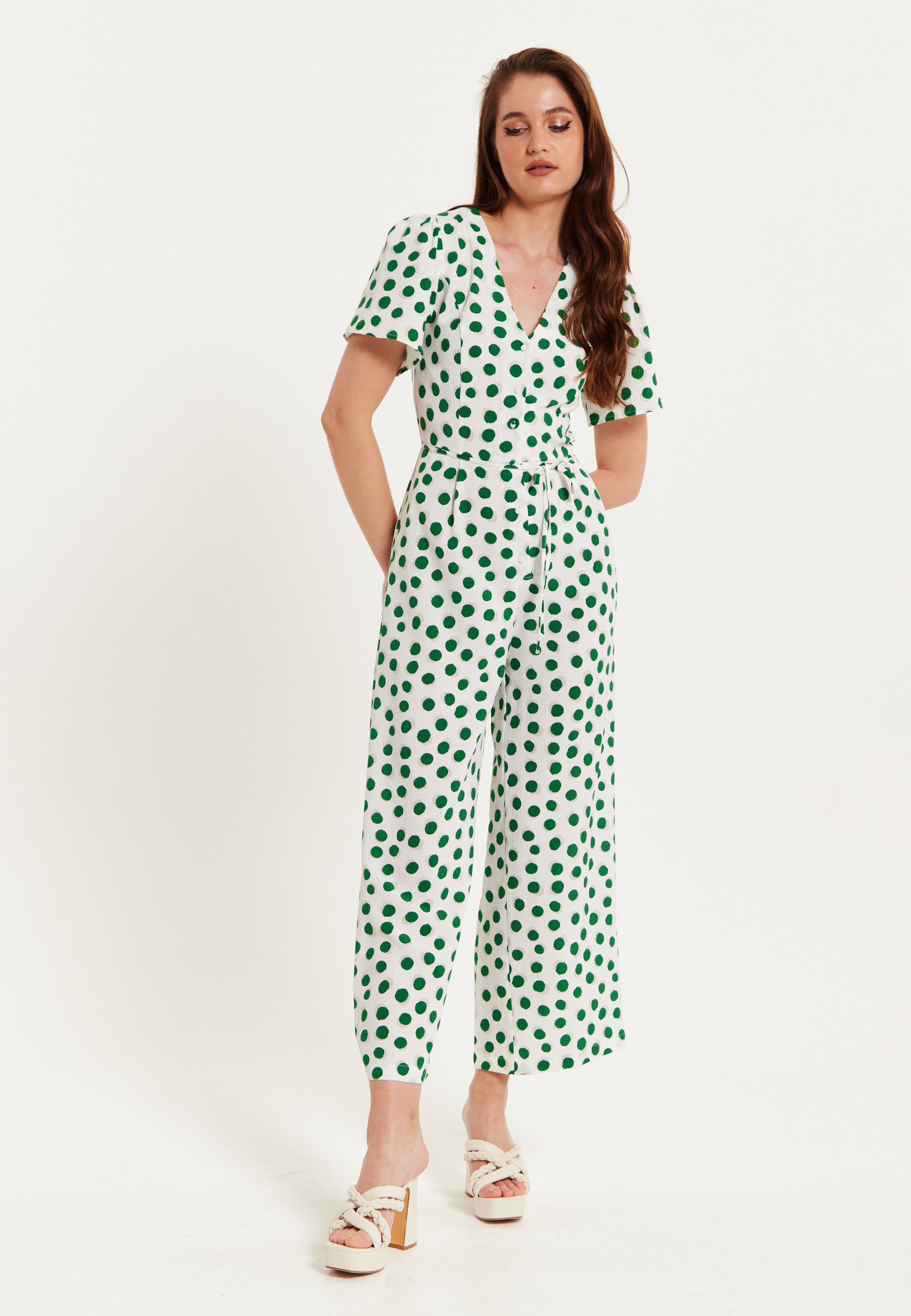 Green and white polka dot jumpsuit on sale