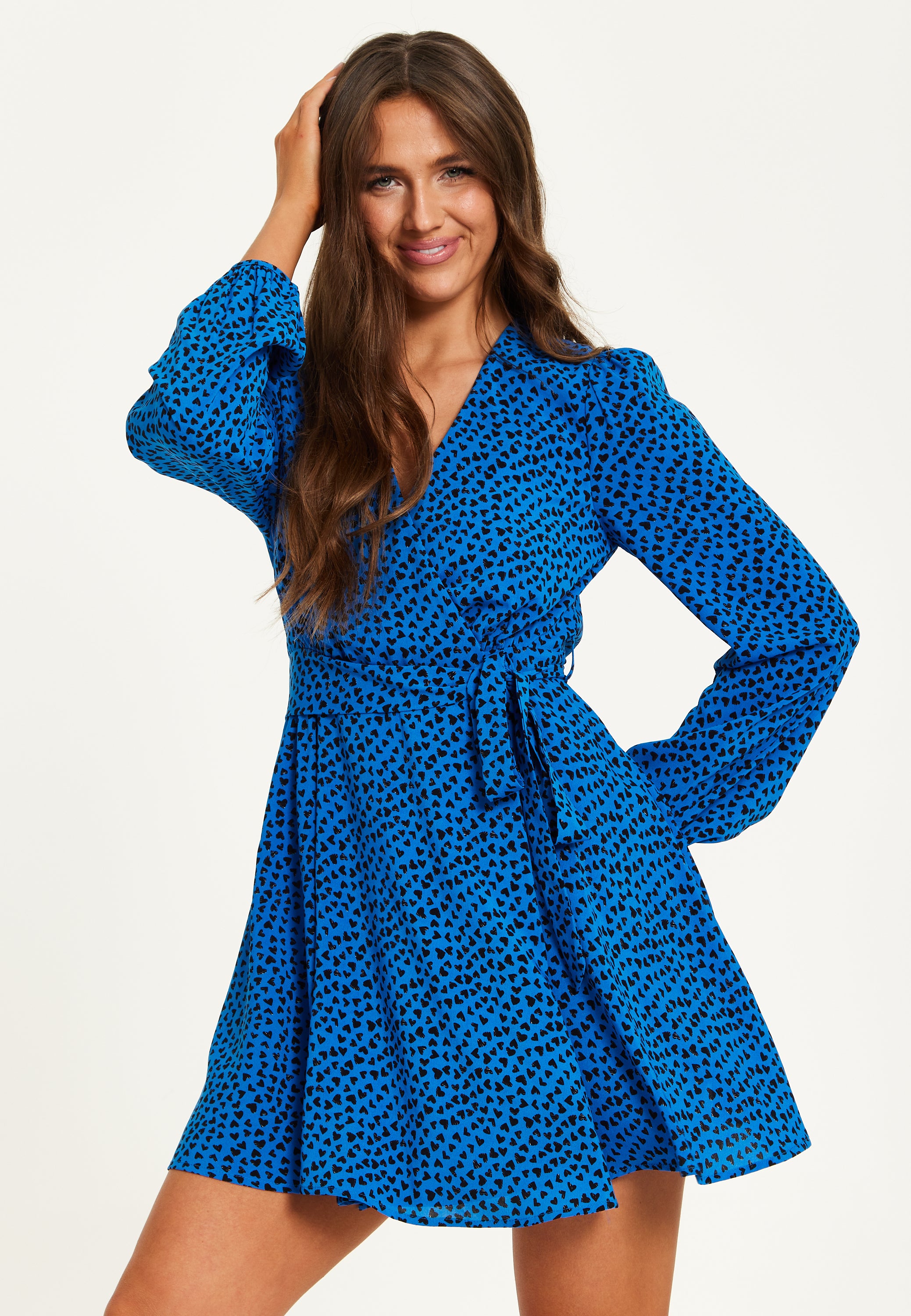 Women s Mini Dress in Royal Blue with Long Sleeves and Heart Print Wrap Design by Liquorish