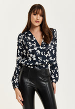Liquorish Floral And Bird Print Wrap Top In Black