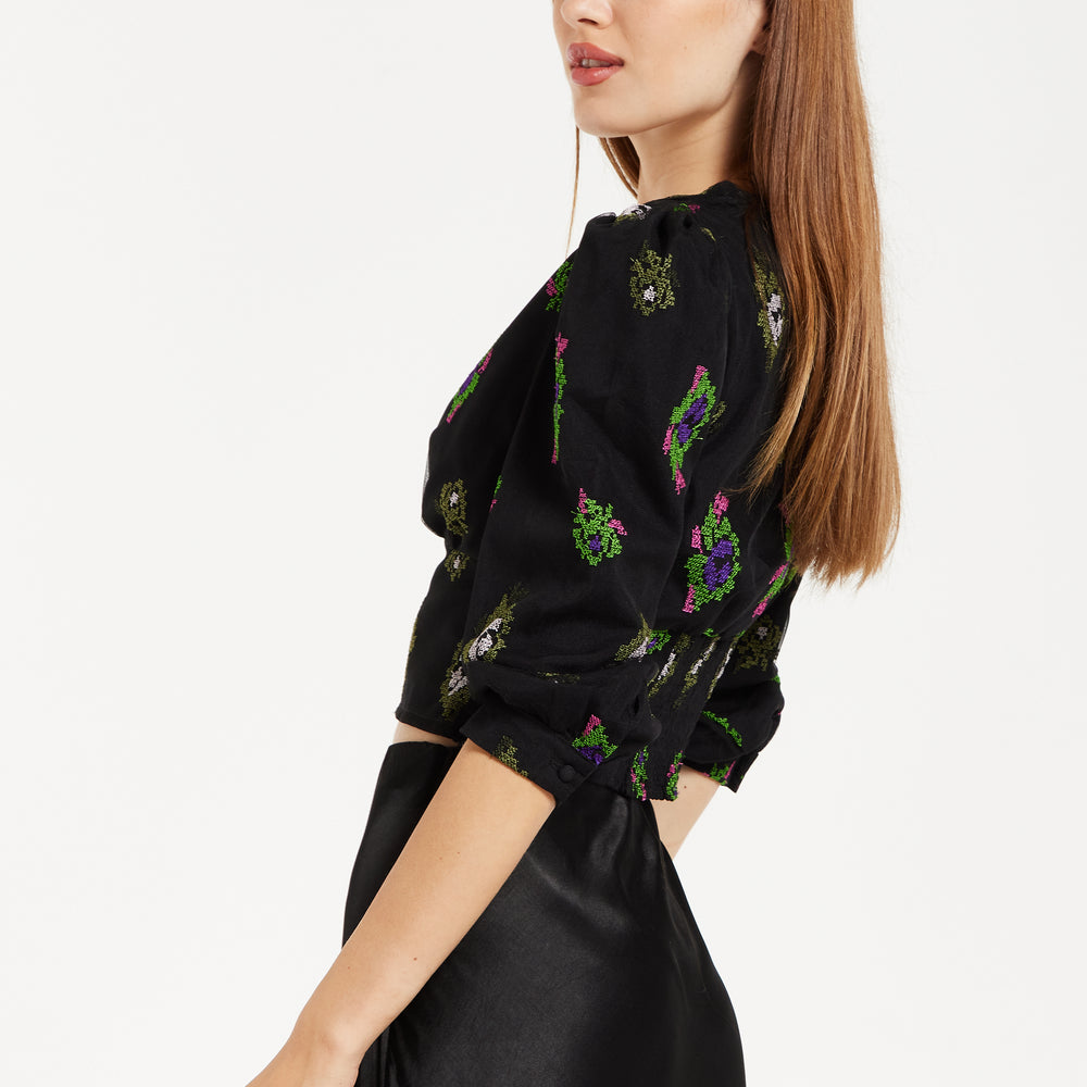 
                  
                    Liquorish Black Embroidered Top with Mesh Sleeves
                  
                