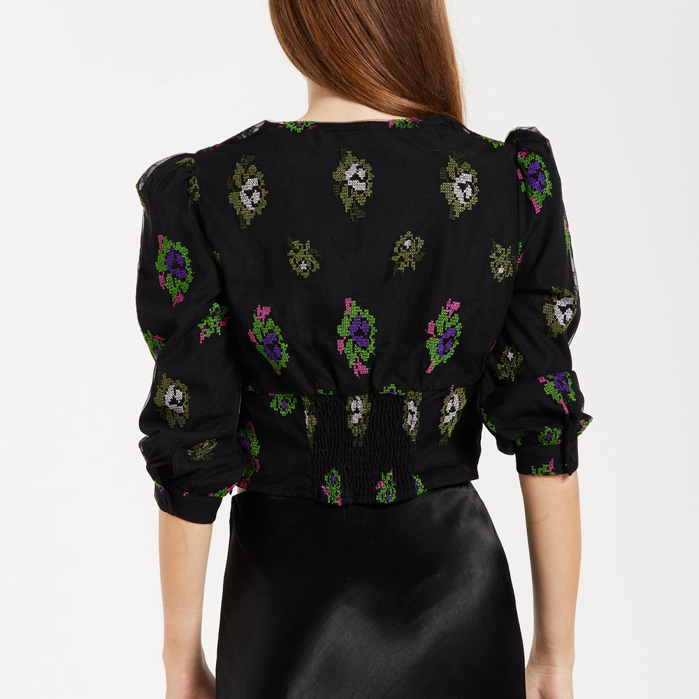 
                  
                    Liquorish Black Embroidered Top with Mesh Sleeves
                  
                