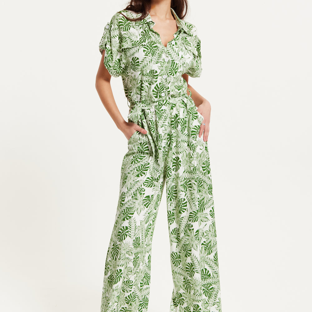 
                  
                    Liquorish Green Leaf Printed Jumpsuit
                  
                