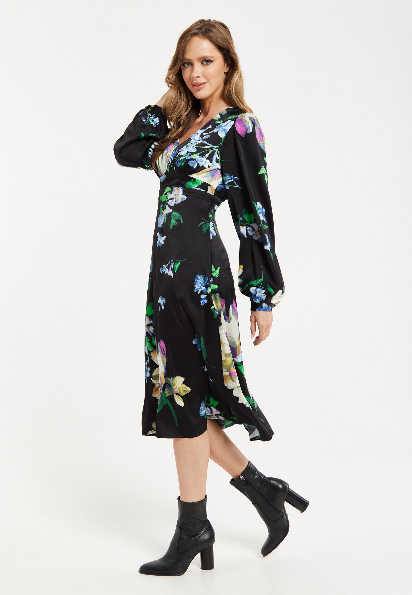 
                  
                    Women's Midi Dress in Black with Long Balloon Sleeves and Elegant Floral Print by Liquorish
                  
                