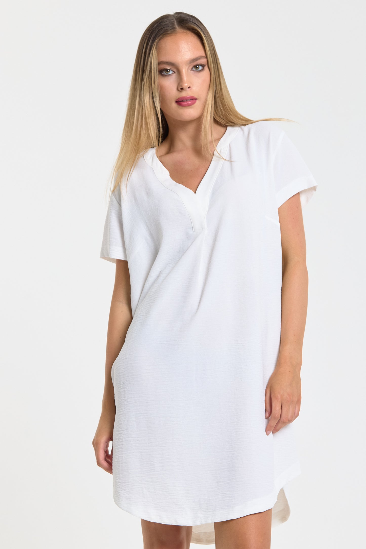 
                  
                    White V-Neck Shift Dress
                  
                