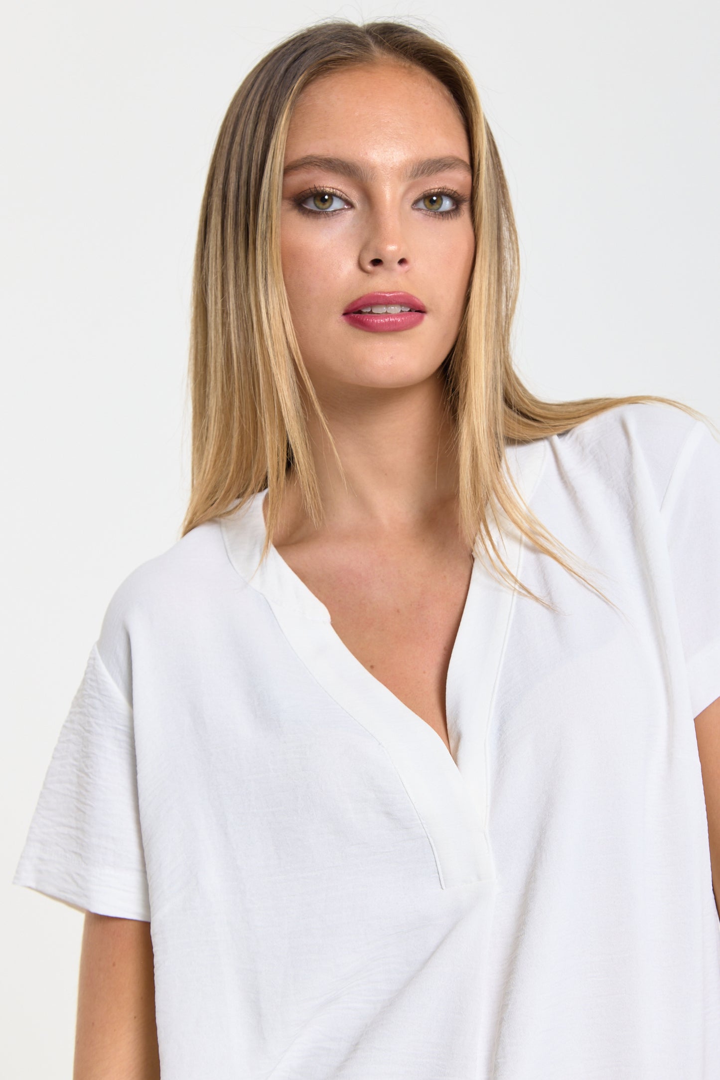 
                  
                    White V-Neck Shift Dress
                  
                