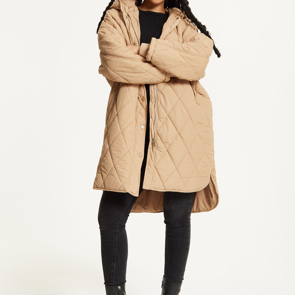 
                  
                    Beige Quilted Hooded Coat
                  
                