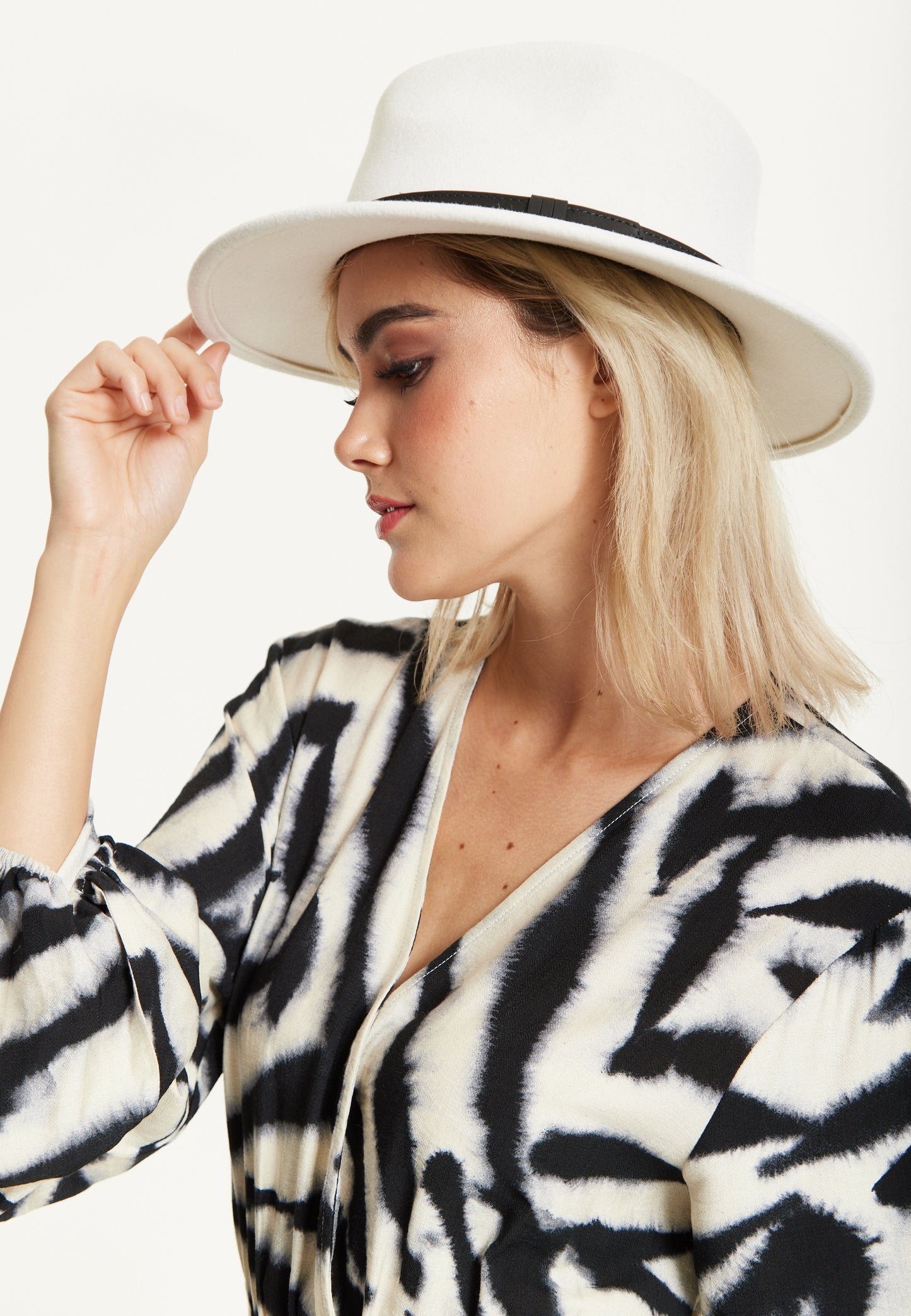 
                  
                    White Wool Fedora Hat
                  
                