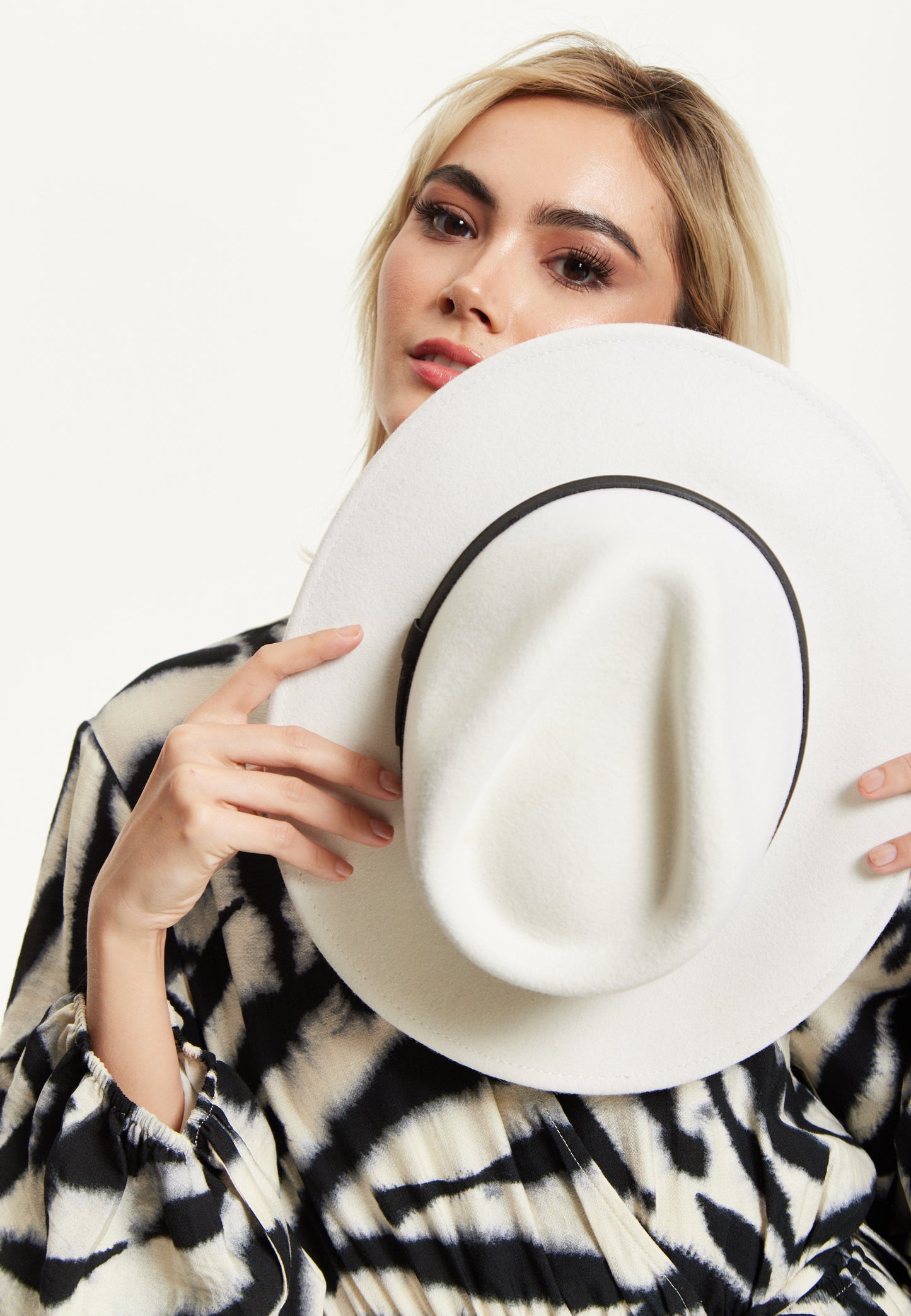 
                  
                    White Wool Fedora Hat
                  
                