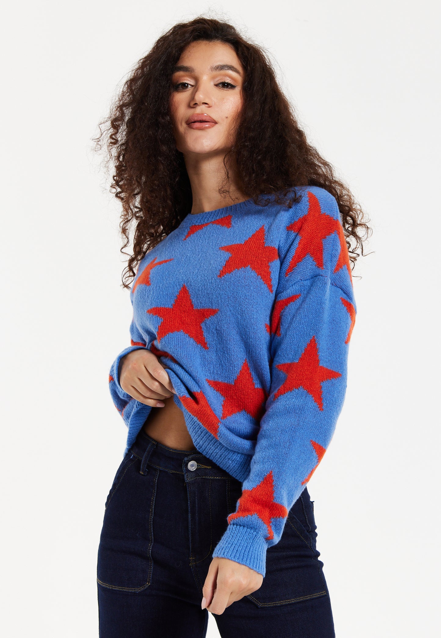 
                  
                    Women's Jumper in Blue with Full-Length Sleeves and Unique Red Star Pattern
                  
                