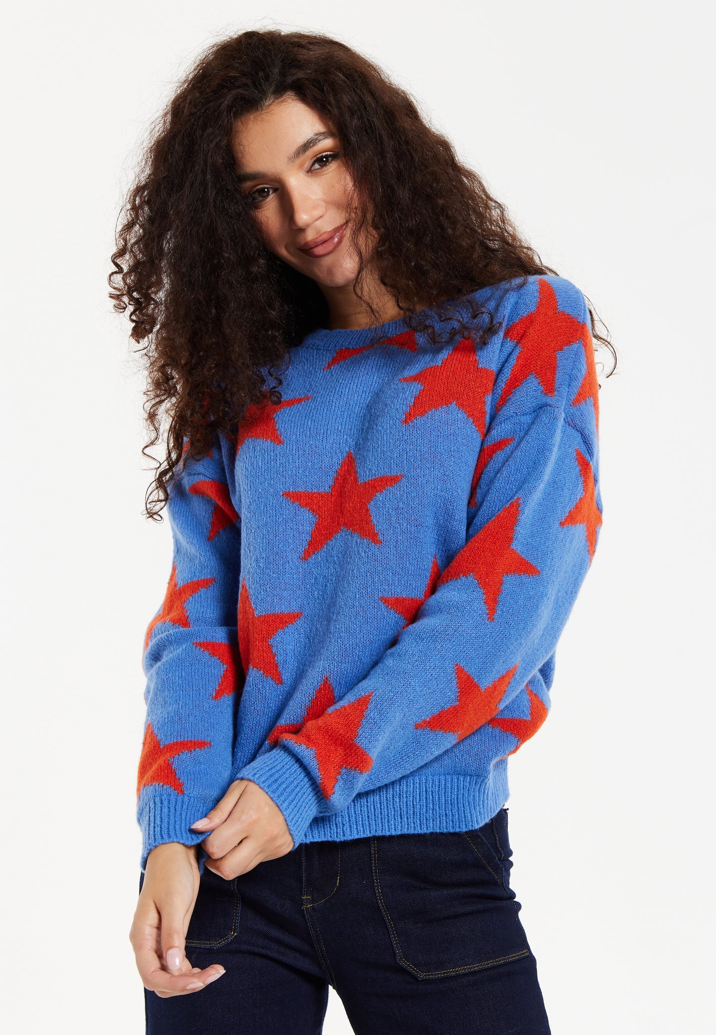 
                  
                    Women's Jumper in Blue with Full-Length Sleeves and Unique Red Star Pattern
                  
                