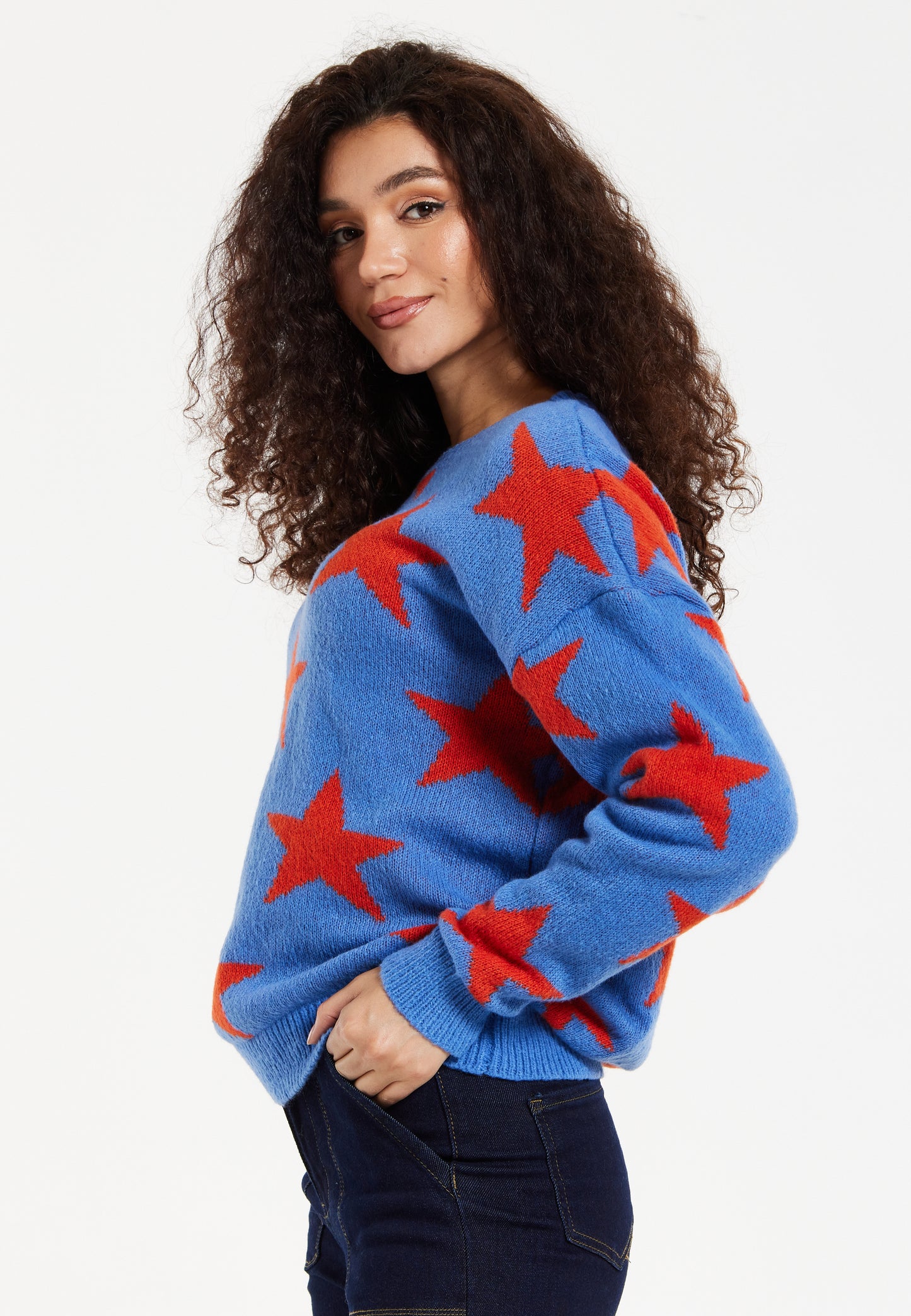 
                  
                    Women's Jumper in Blue with Full-Length Sleeves and Unique Red Star Pattern
                  
                