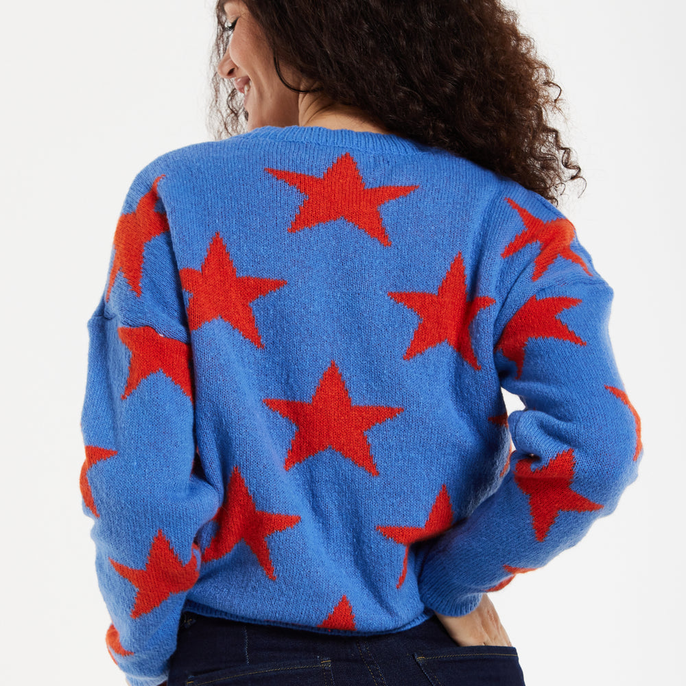 
                  
                    Women's Jumper in Blue with Full-Length Sleeves and Unique Red Star Pattern
                  
                