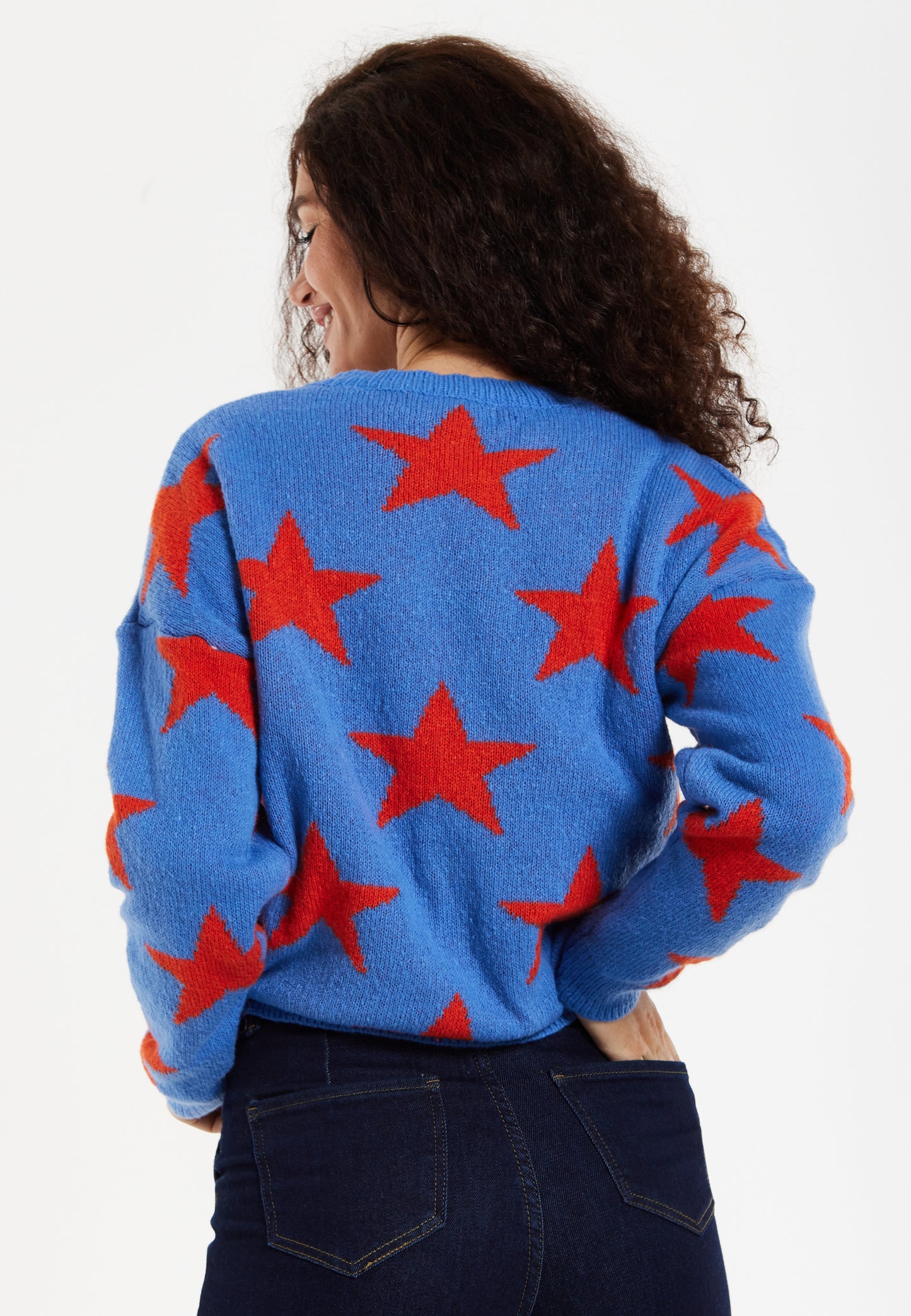 
                  
                    Women's Jumper in Blue with Full-Length Sleeves and Unique Red Star Pattern
                  
                