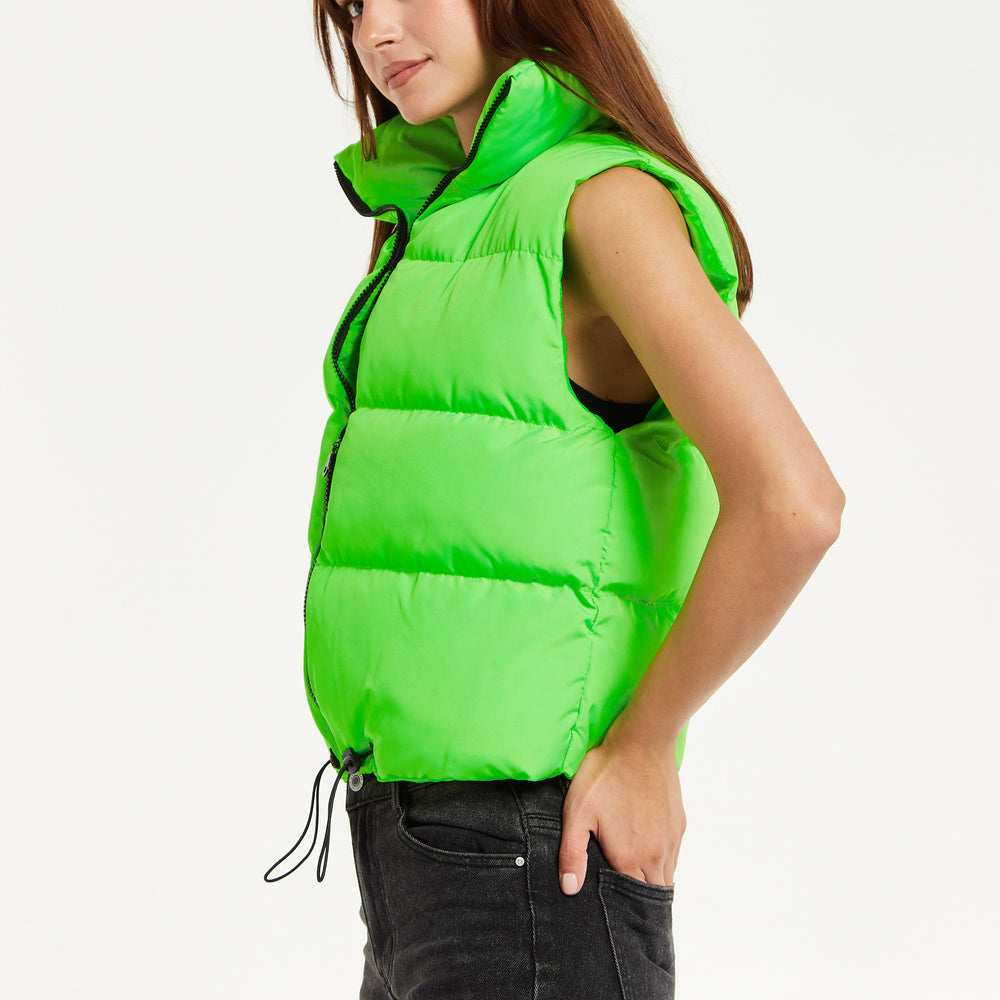 
                  
                    Liquorish Green Puffer Vest with Drawstring Hem
                  
                