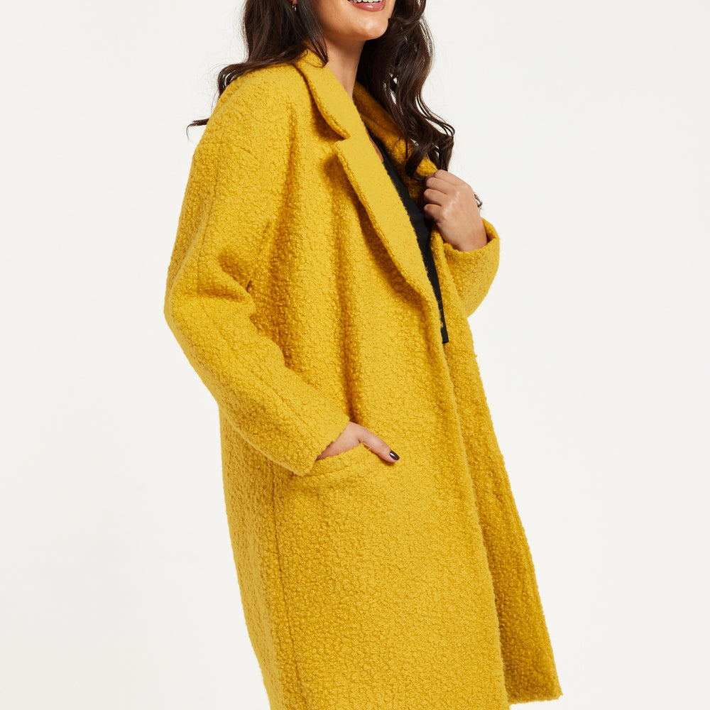 
                  
                    Liquorish Classic Mustard Yellow Bouclè Coat with Notched Lapels
                  
                