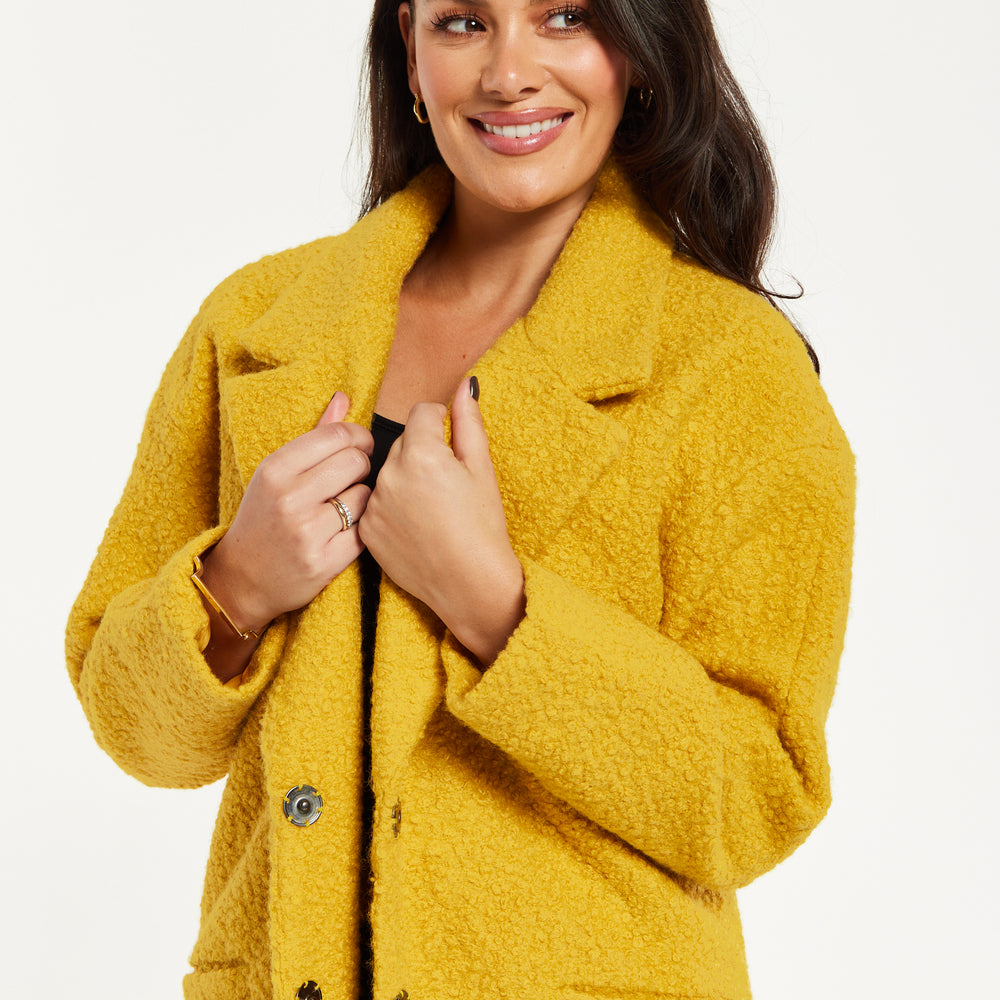 
                  
                    Liquorish Classic Mustard Yellow Bouclè Coat with Notched Lapels
                  
                