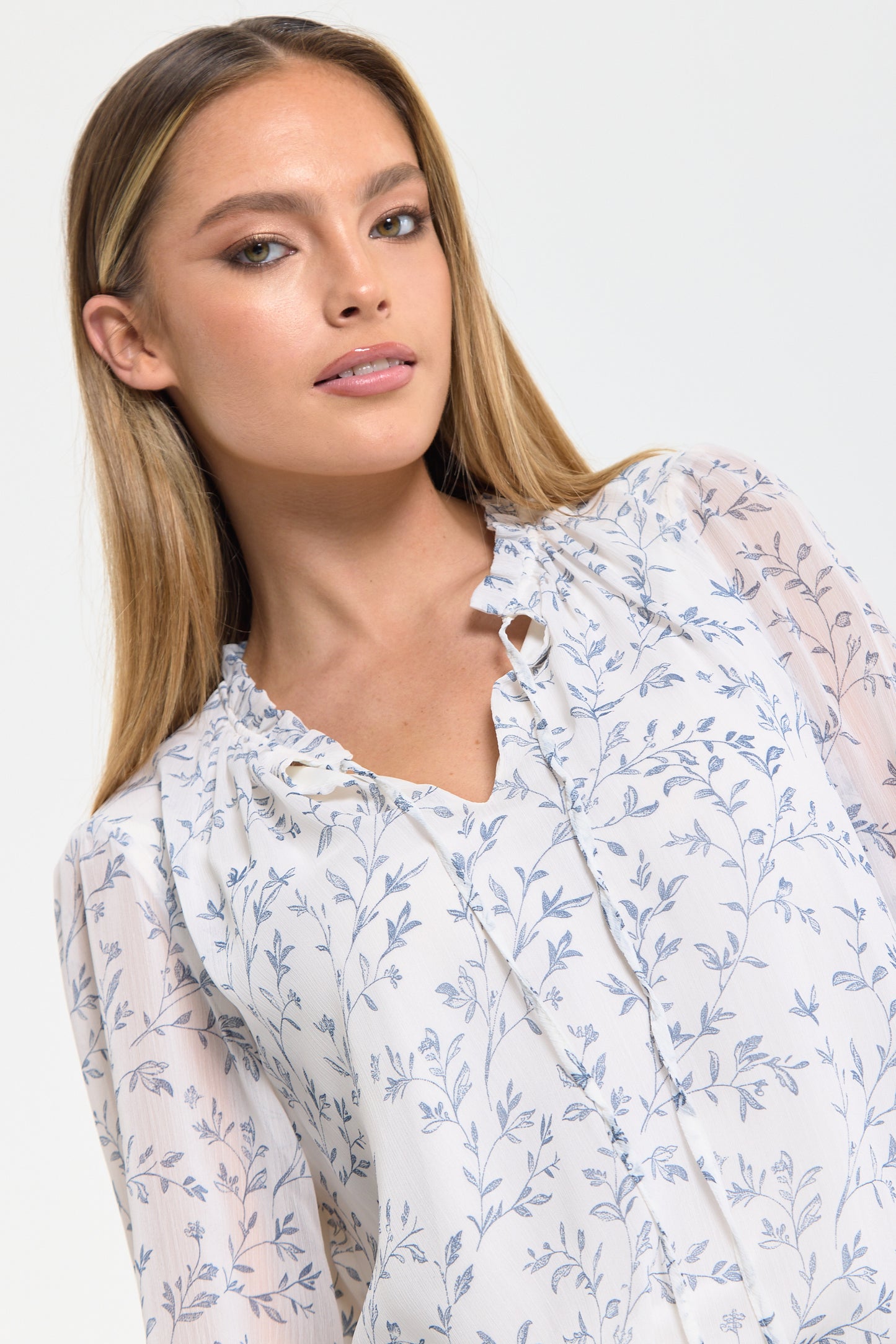 
                  
                    Blue Vine Print Ruffle Blouse
                  
                