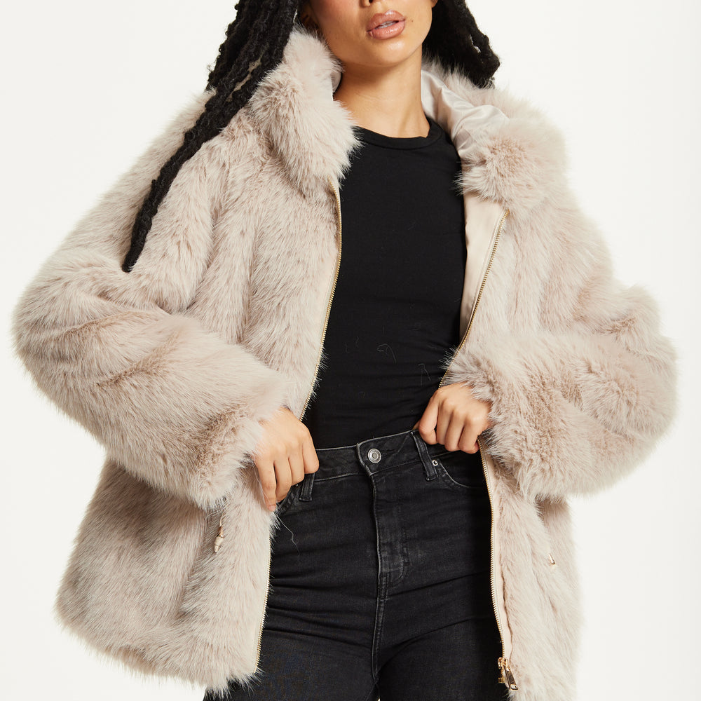 
                  
                    Faux Fur Hooded Coat in Beige
                  
                