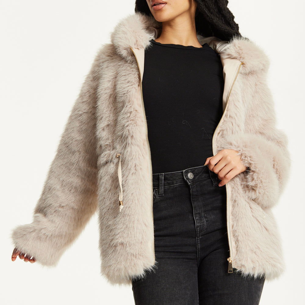 
                  
                    Faux Fur Hooded Coat in Beige
                  
                