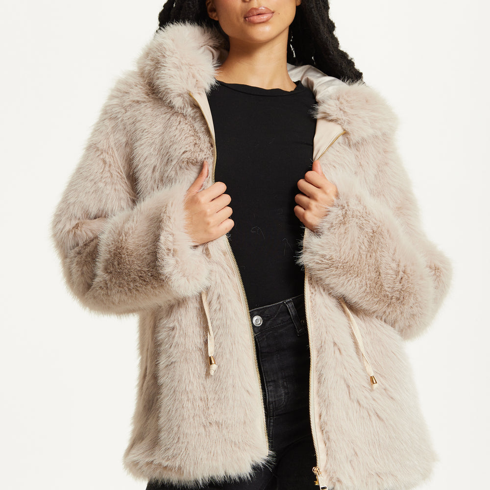 
                  
                    Faux Fur Hooded Coat in Beige
                  
                