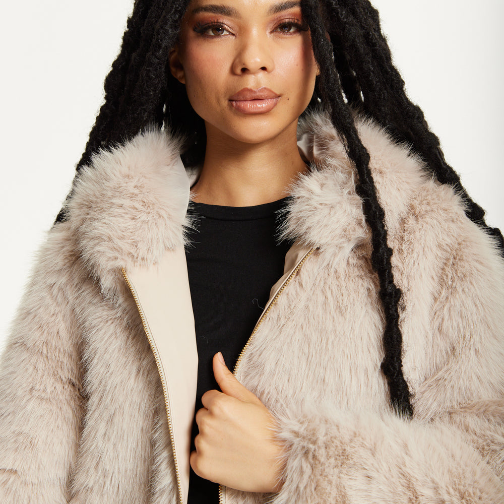 
                  
                    Faux Fur Hooded Coat in Beige
                  
                