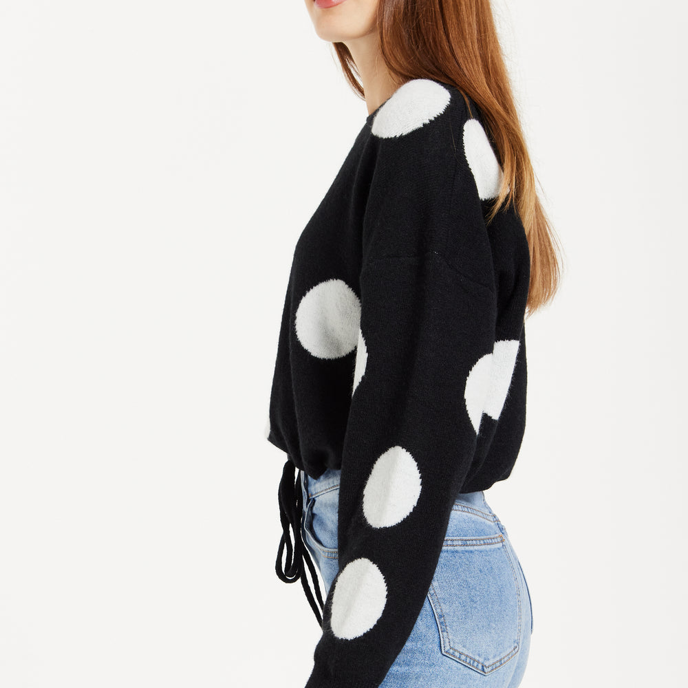 
                  
                    Women's Black Jumper with Long Sleeves and White Polka Dots - Adjustable Waist Tie by Liquorish
                  
                