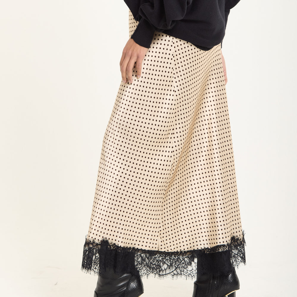 
                  
                    Beige Polka Dot Skirt with Black Lace Trim
                  
                