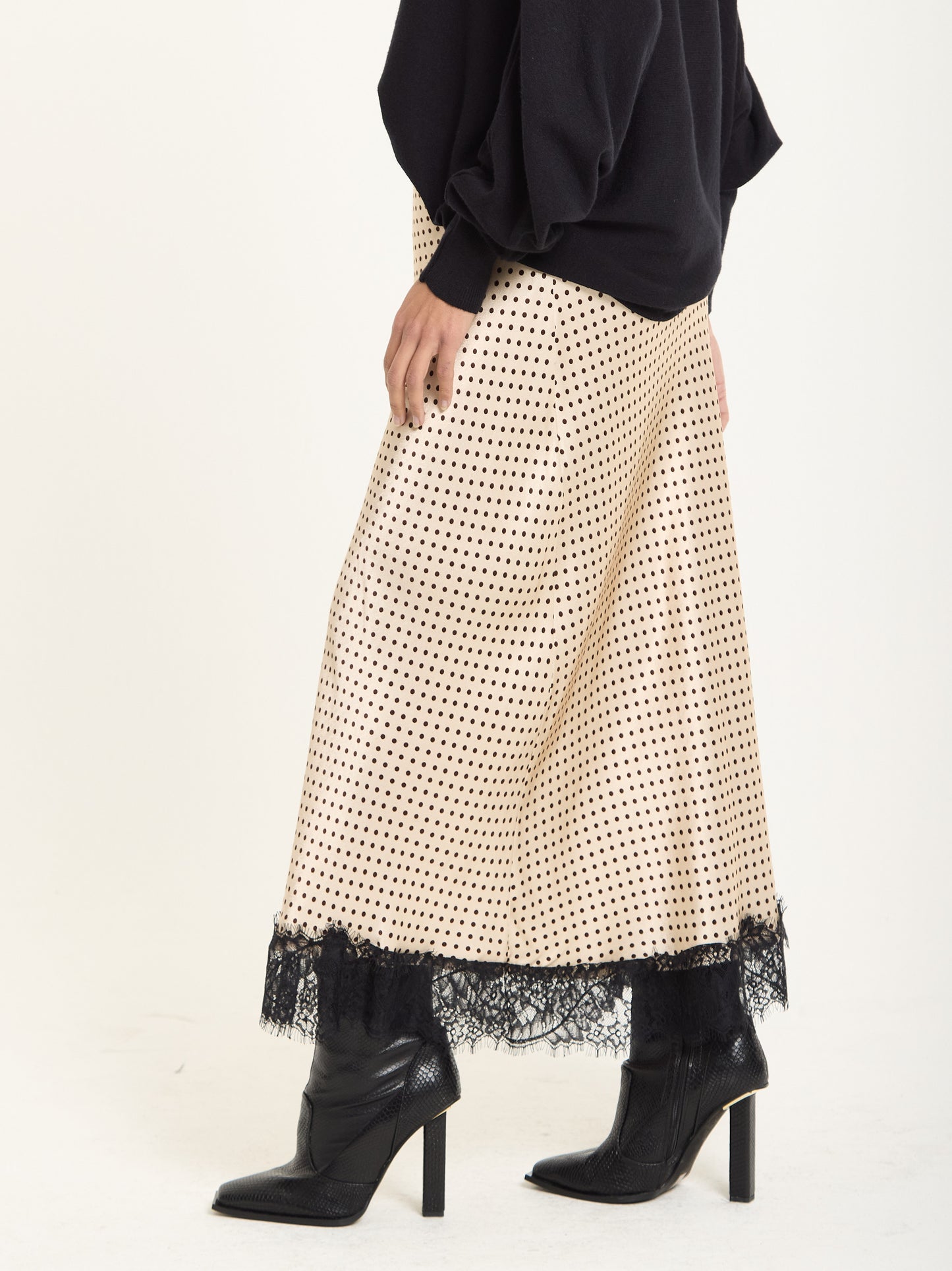 
                  
                    Beige Polka Dot Skirt with Black Lace Trim
                  
                