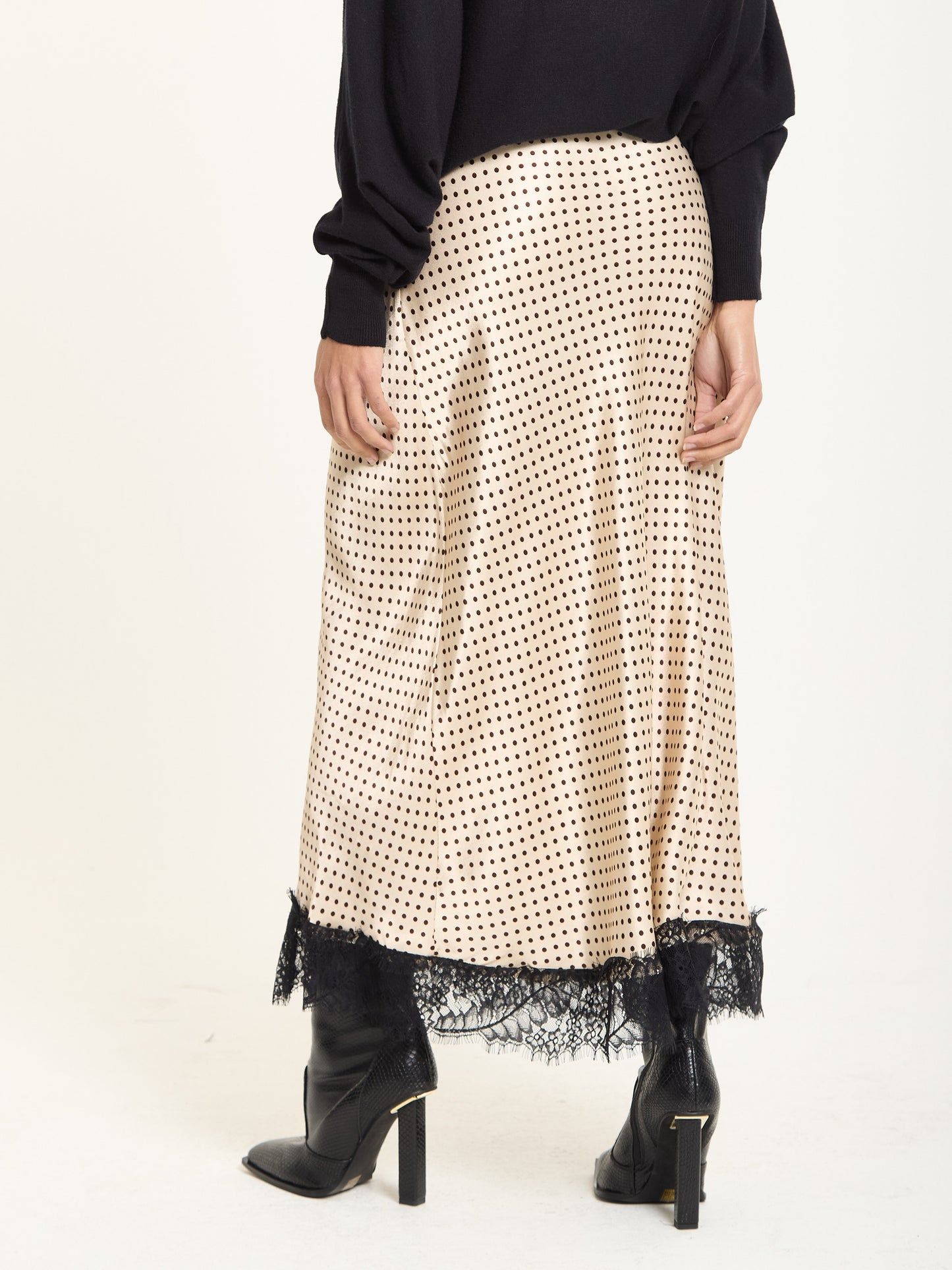
                  
                    Beige Polka Dot Skirt with Black Lace Trim
                  
                