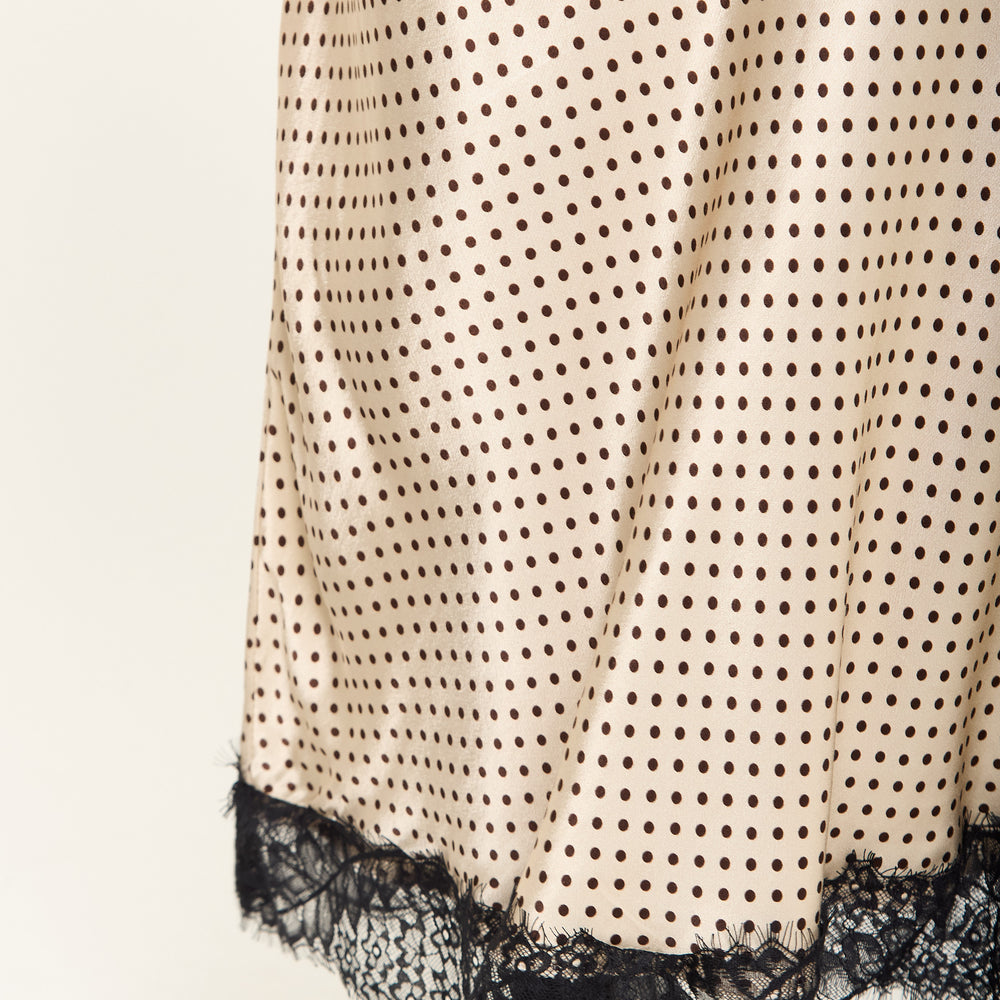 
                  
                    Beige Polka Dot Skirt with Black Lace Trim
                  
                