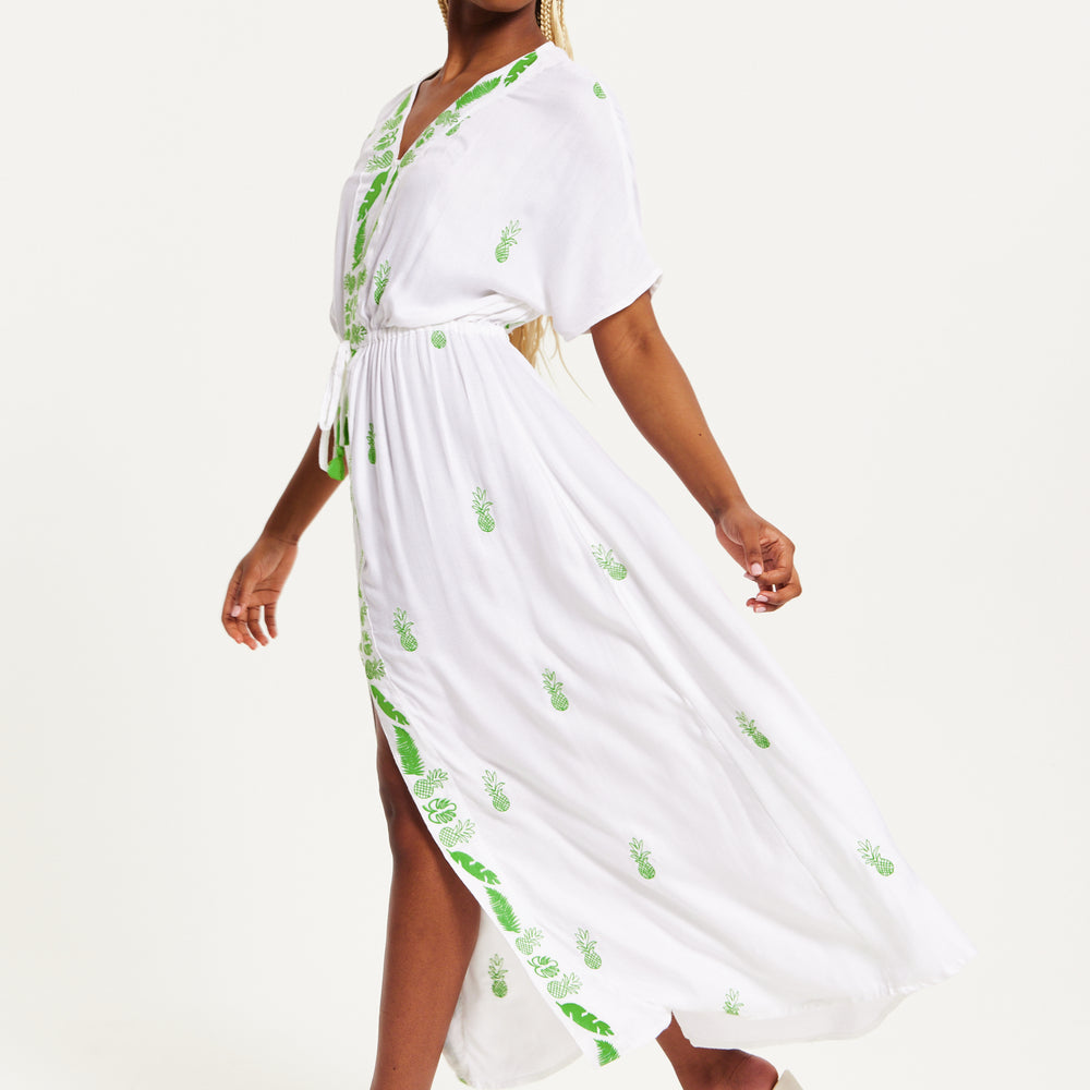 
                  
                    Liquorish White Maxi Beach Dress with Green Pineapple Embroidery
                  
                