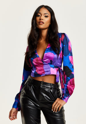Liquorish Abstract Print Wrap Top In Blue And Purple