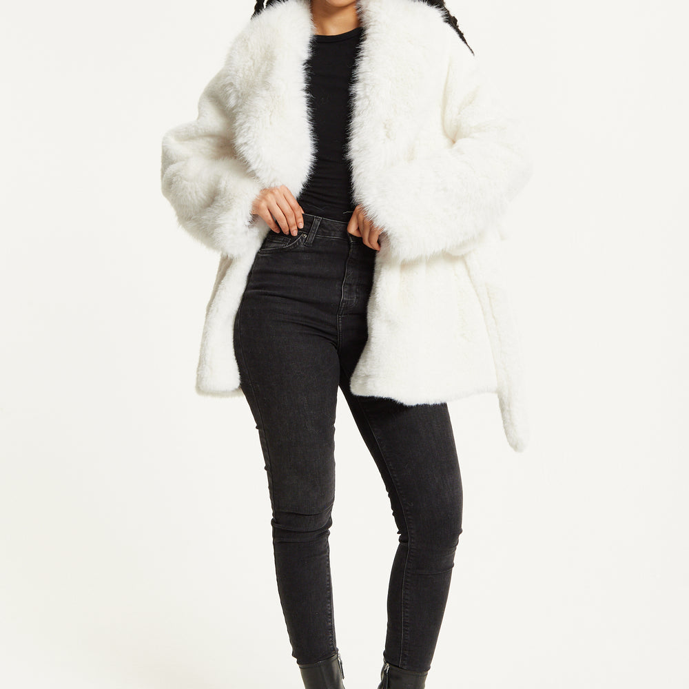 
                  
                    Faux Fur Coat in White
                  
                