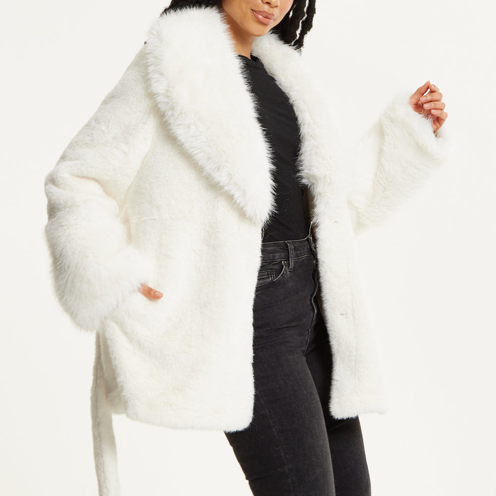 
                  
                    Faux Fur Coat in White
                  
                