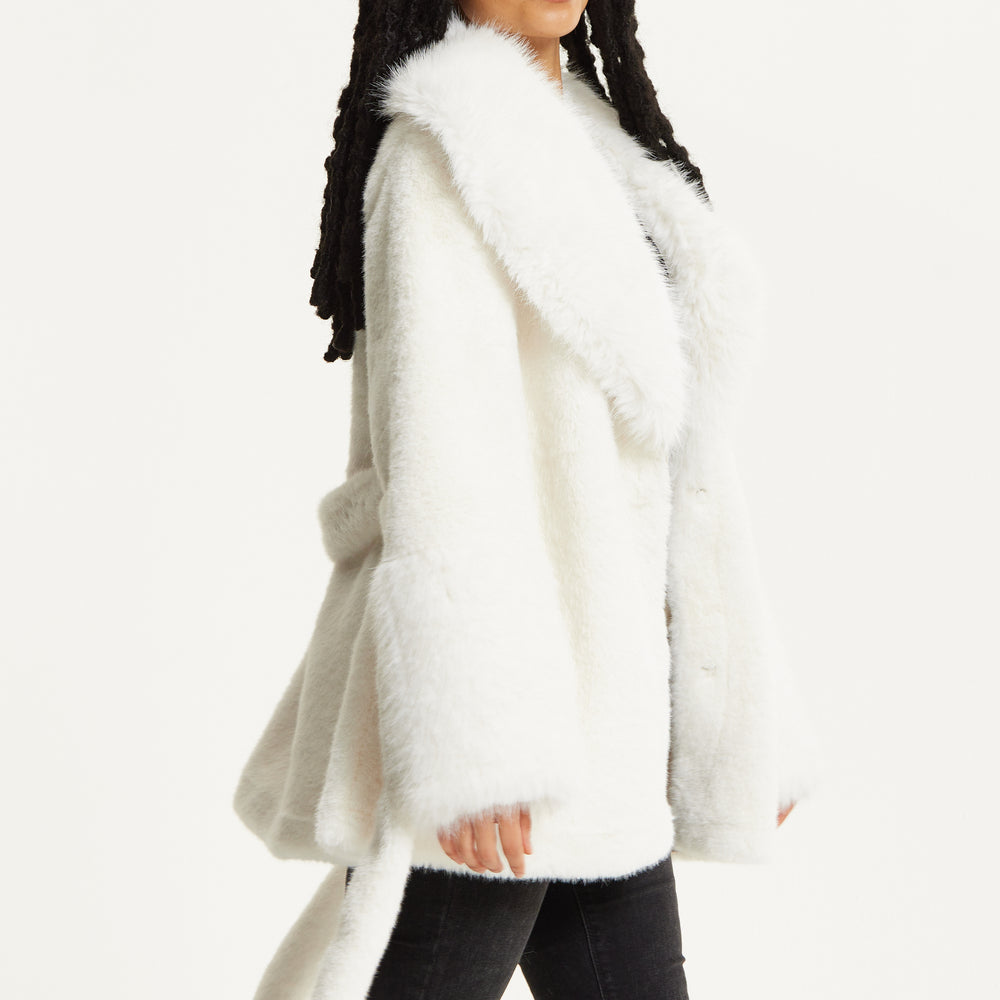 
                  
                    Faux Fur Coat in White
                  
                