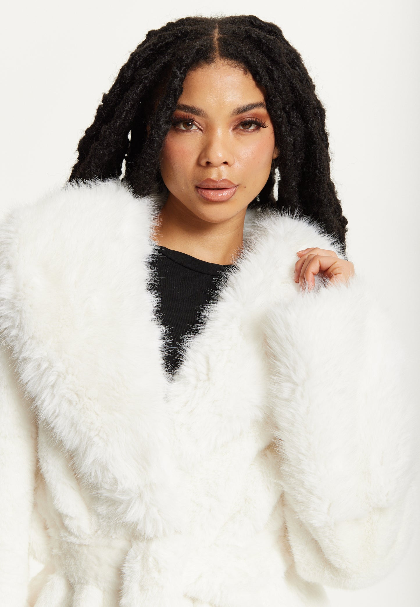 
                  
                    Faux Fur Coat in White
                  
                