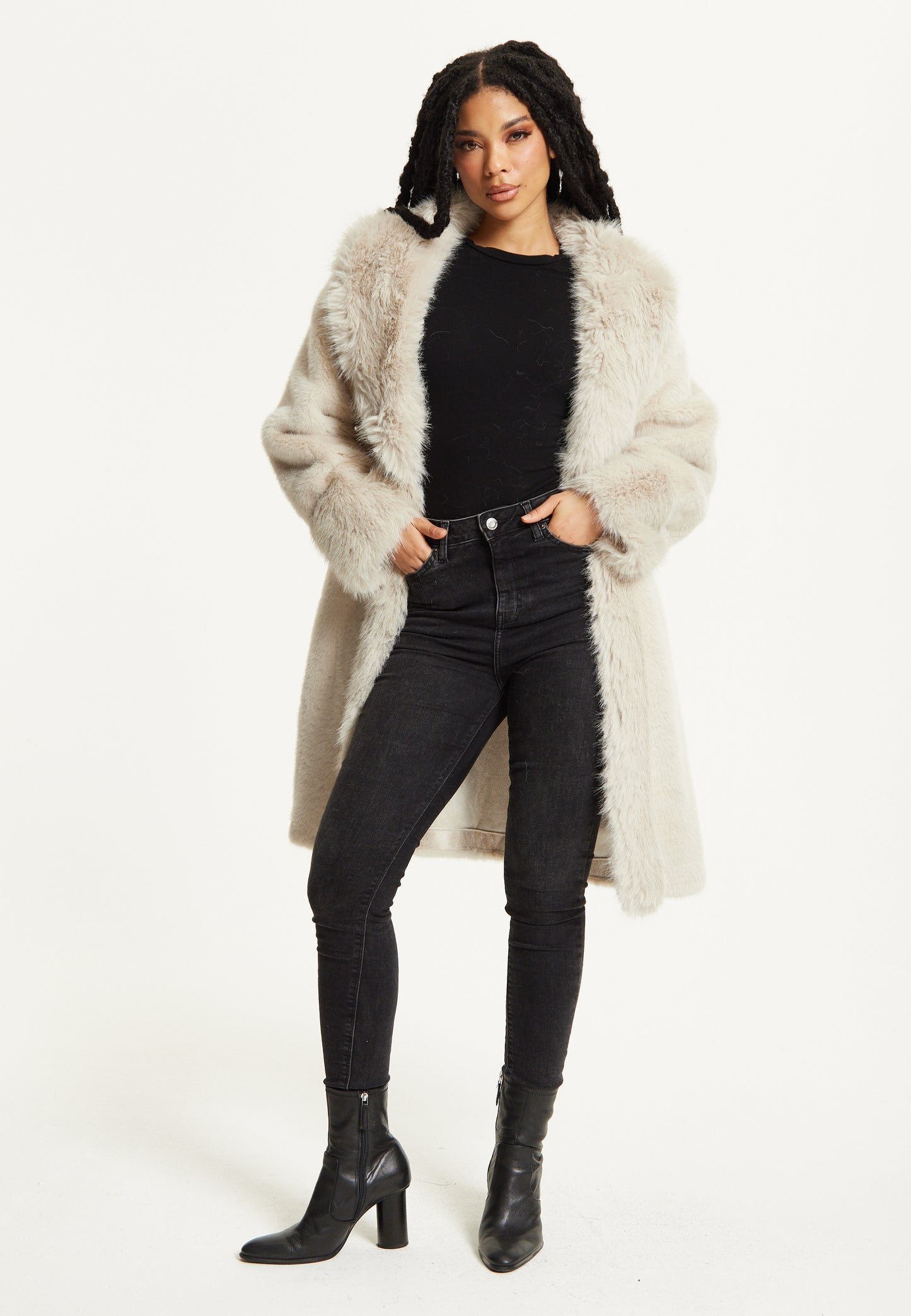 
                  
                    Long Faux Fur Coat in Beige
                  
                