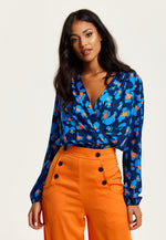 Liquorish Abstract Print Wrap Top In Pink Orange And Blue