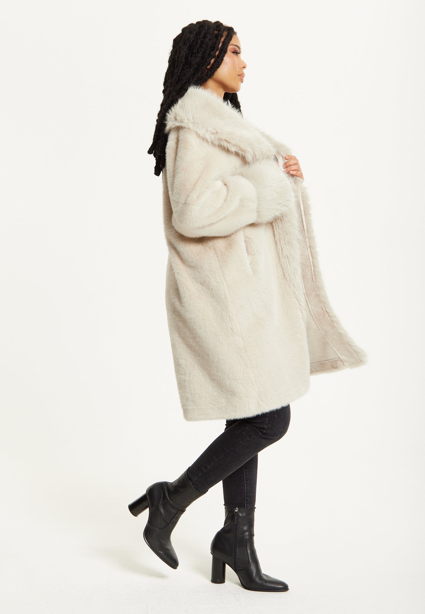 
                  
                    Long Faux Fur Coat in Beige
                  
                