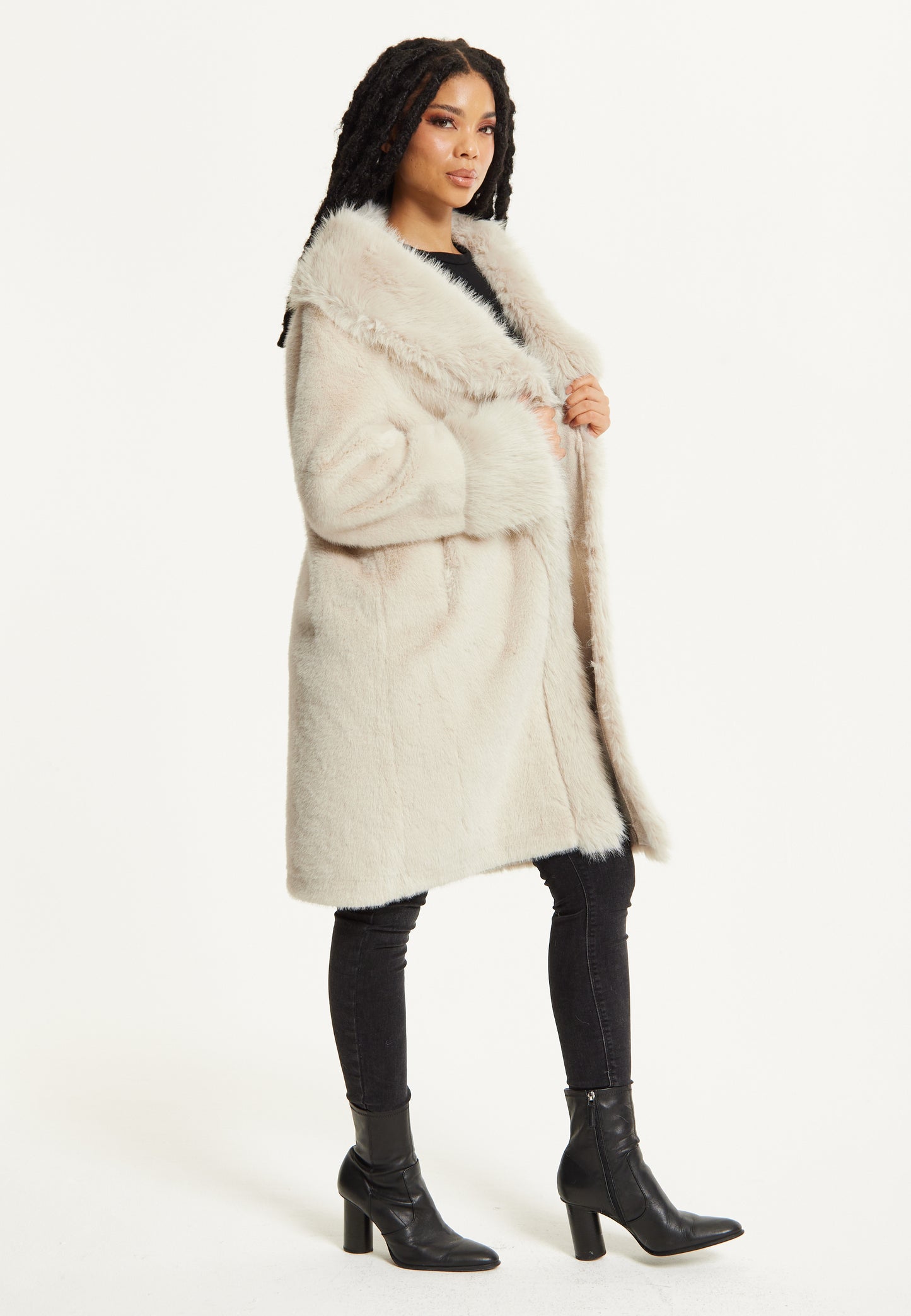 
                  
                    Long Faux Fur Coat in Beige
                  
                