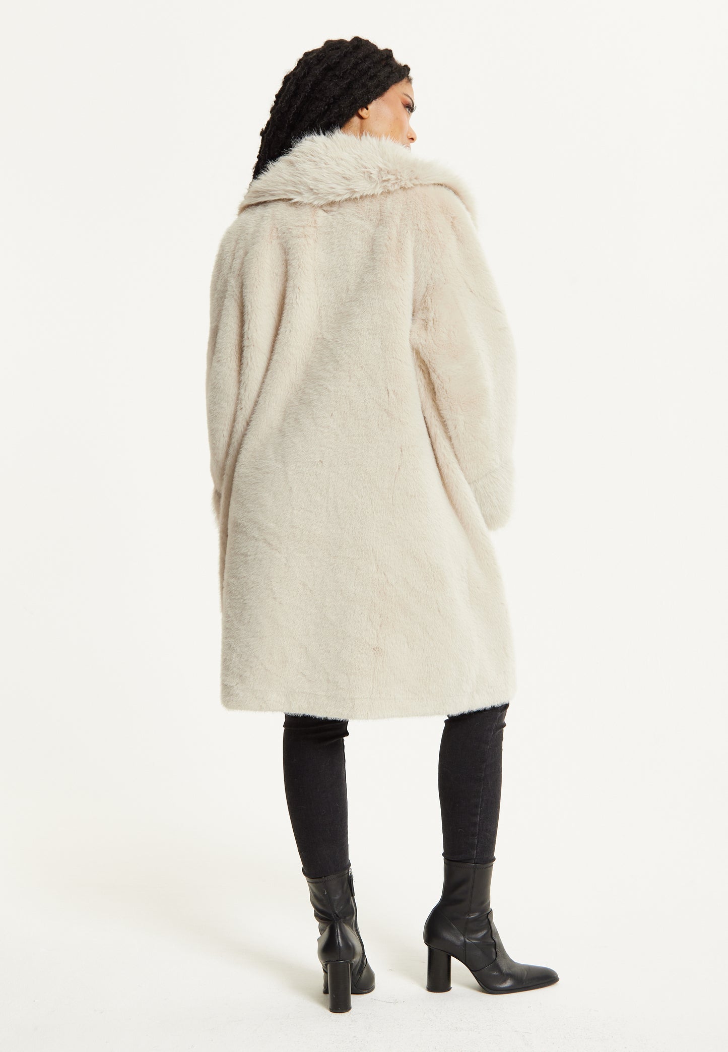 
                  
                    Long Faux Fur Coat in Beige
                  
                