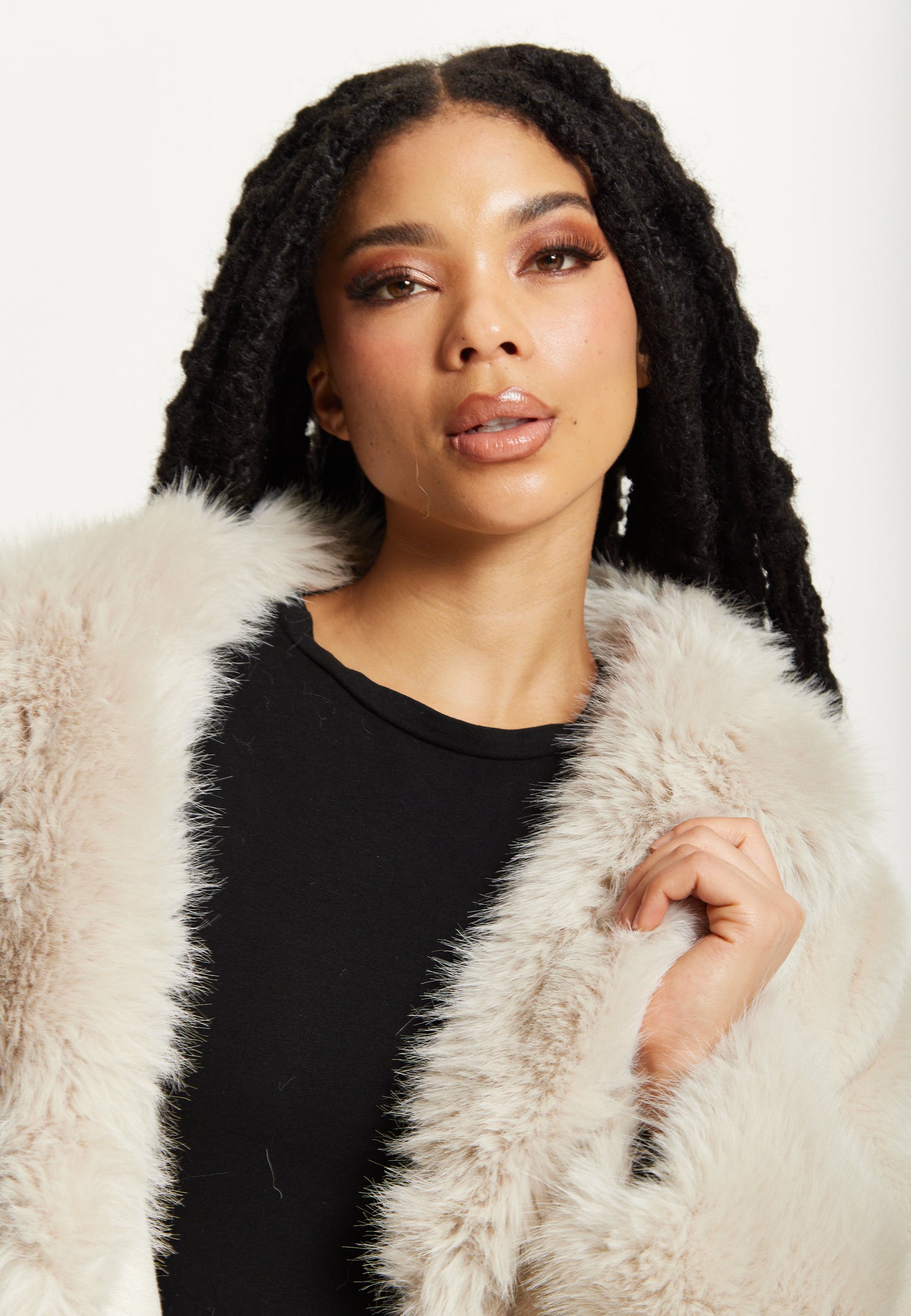 
                  
                    Long Faux Fur Coat in Beige
                  
                