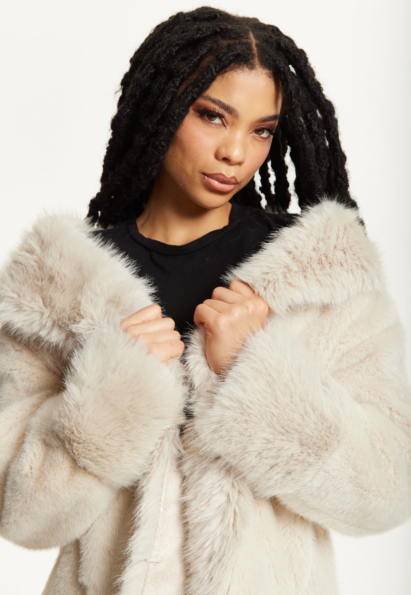 
                  
                    Long Faux Fur Coat in Beige
                  
                