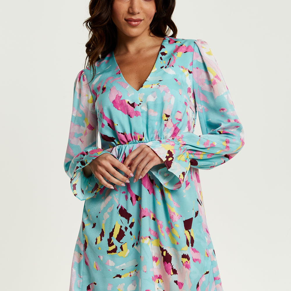 
                  
                    Liquorish Blue Abstract Print Mini Dress With Open Back And Long Sleeves
                  
                