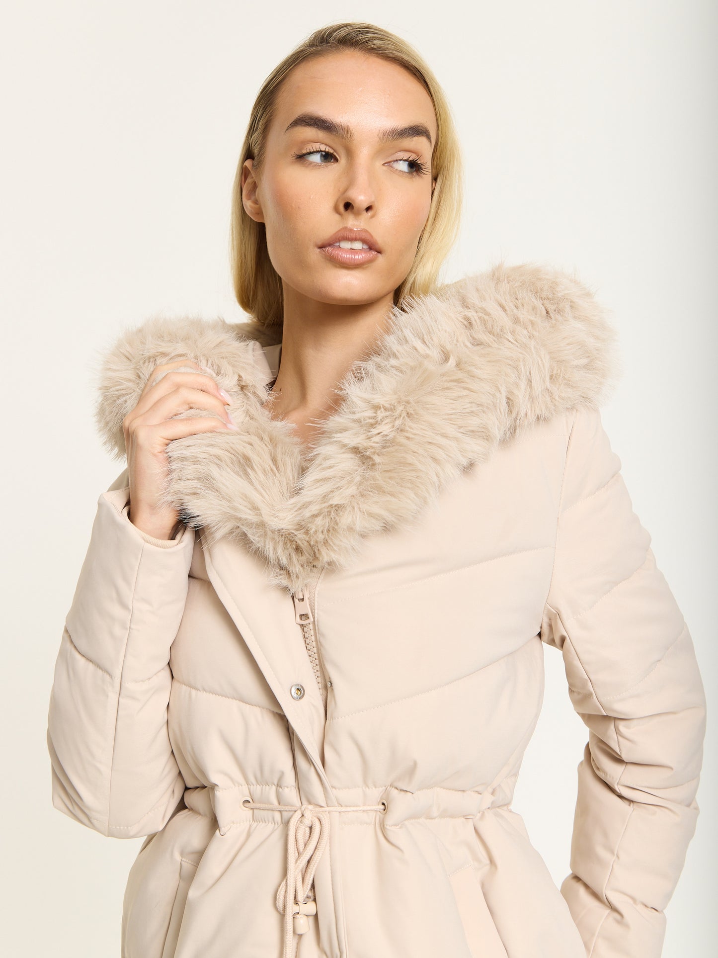 
                  
                    Beige Long Padded Coat with Faux Fur Hood
                  
                