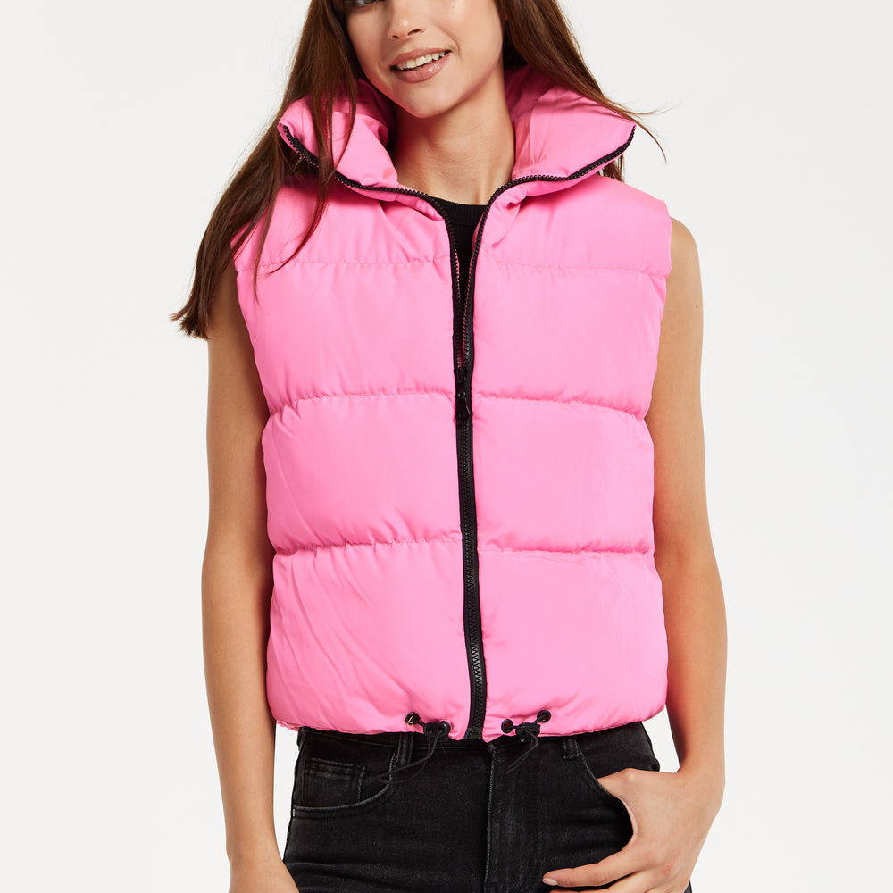 
                  
                    Liquorish Pink Puffer Vest with Drawstring Hem
                  
                