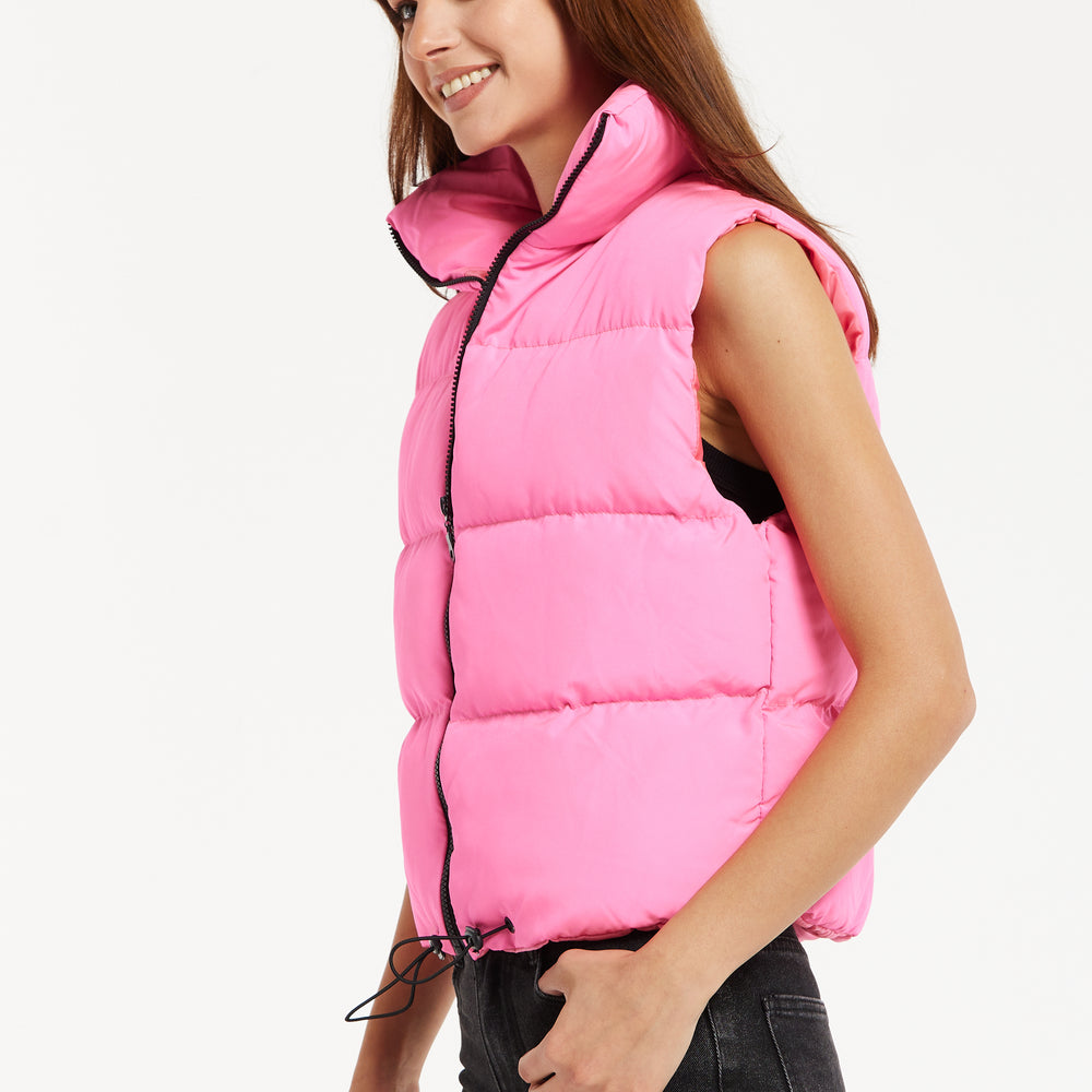 
                  
                    Liquorish Pink Puffer Vest with Drawstring Hem
                  
                