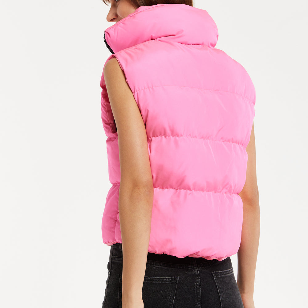 
                  
                    Liquorish Pink Puffer Vest with Drawstring Hem
                  
                